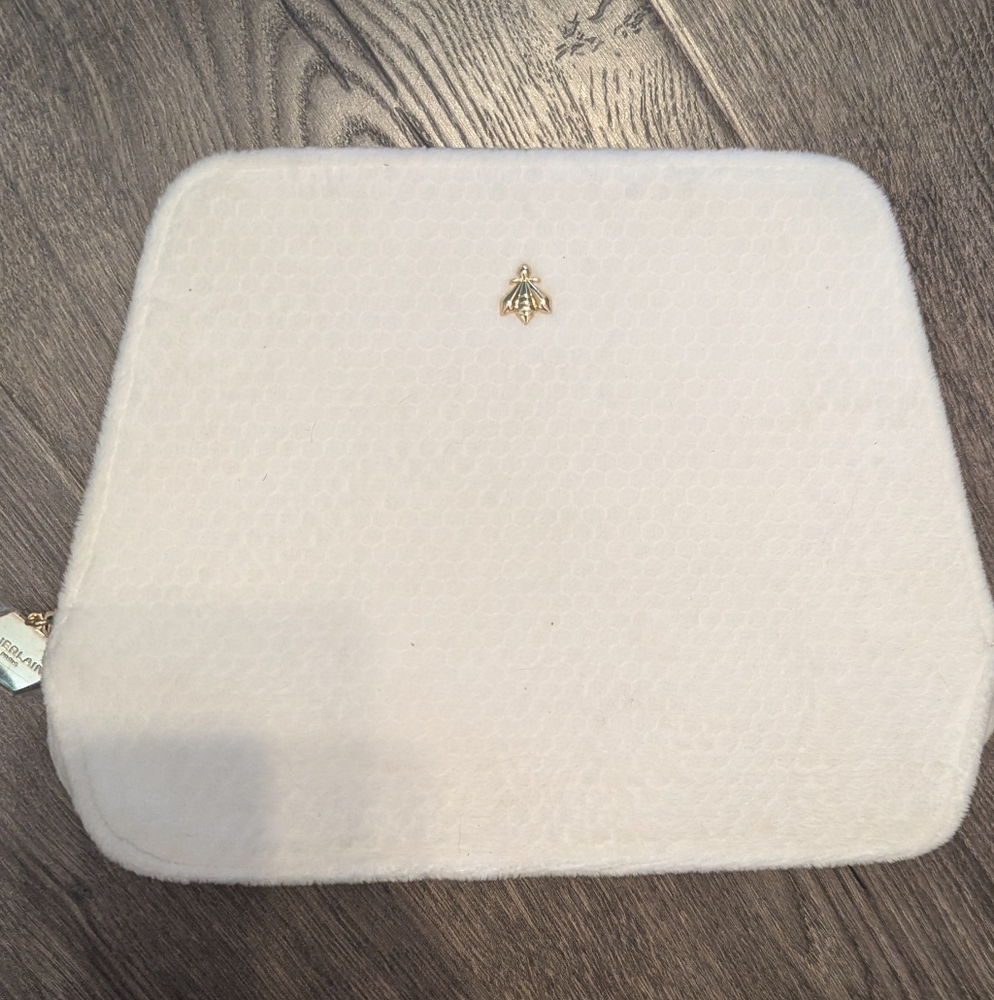 Guerlain White Clutch with Gold Emblem